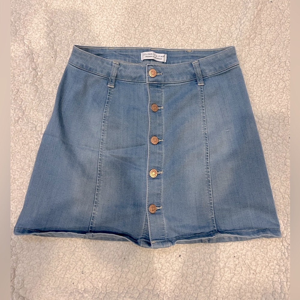 Jean mini skirt. Brand new. Real buttons on the front